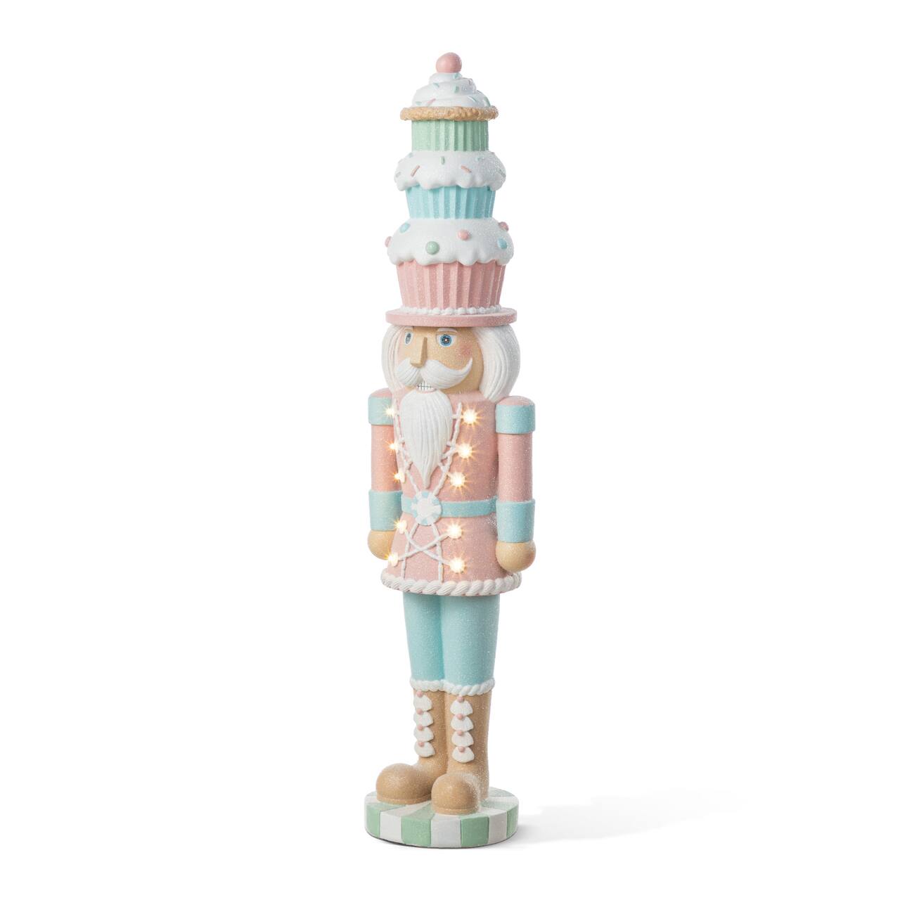 Glitzhome® 28" Lighted Resin Christmas Cupcake Nutcracker Porch Decor with Timer